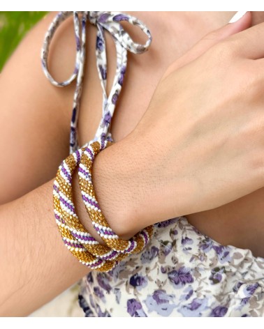 Bracelet népalais - torsadé - doré  - blanc - violet - coloré - perles - tissé à la main - perles